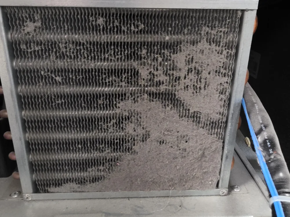 Dirty AC condenser coil before cleaning in American Fork, Utah